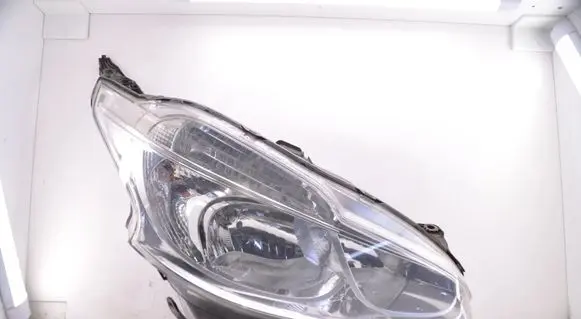Peugeot 208 I Headlight/headlamp 9802221280