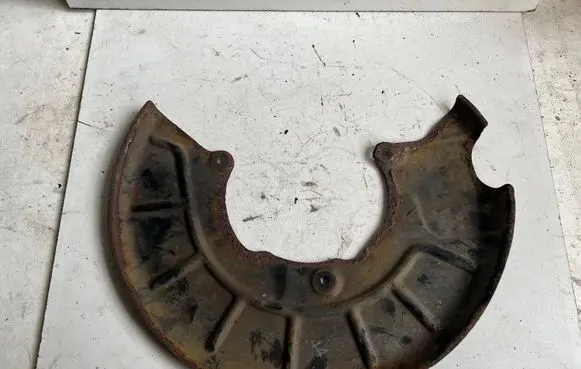 Volkswagen Golf VI Front brake disc dust cover plate 1K0615311F