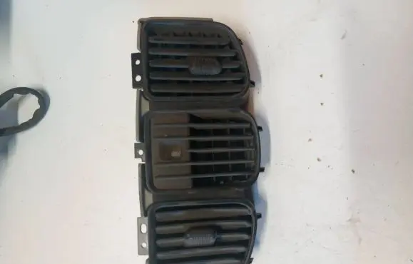 Dash center air vent grill