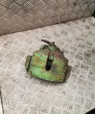 Volkswagen Golf VI Front brake caliper