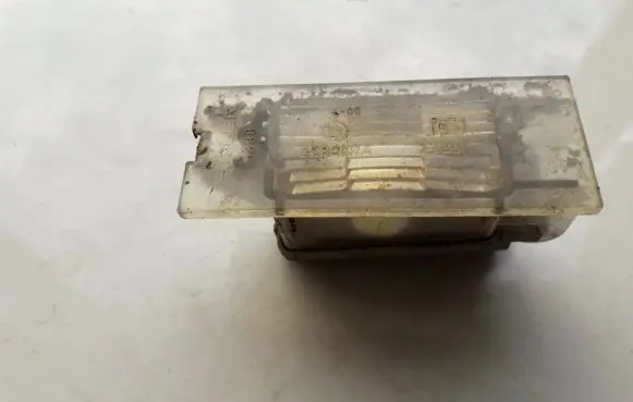 Renault Megane II Number plate light 7700796163