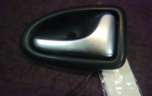 Renault Megane II Front door interior handle 8200028995