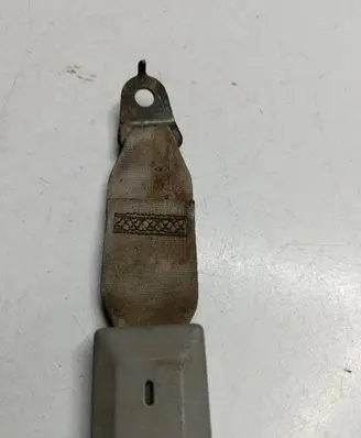 Rear seatbelt buckle