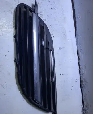 Nissan Almera Tino Front bumper lower grill 9381M010