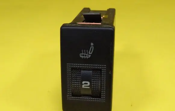 Seat heating switch