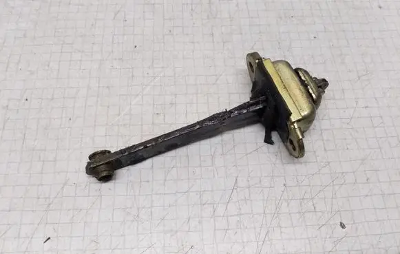 Nissan Terrano Front door check strap stopper