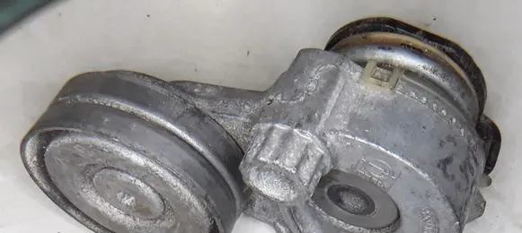 Opel Astra H Alternator belt tensioner 55556090AZ 2100003