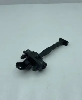 Front door check strap stopper