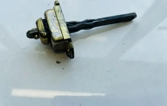 Nissan Micra Front door check strap stopper 