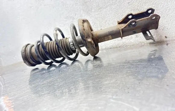 Opel Astra J Front shock absorber with coil spring 13354029