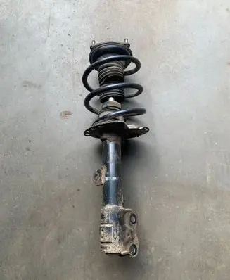 Mitsubishi Outlander Front shock absorber with coil spring 4060A569