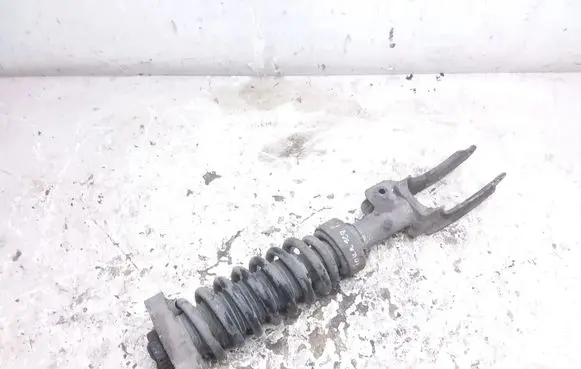 Volkswagen Touareg I Front shock absorber with coil spring 7L6412022N