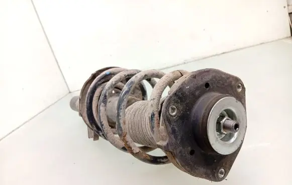 Volkswagen Golf VI Front shock absorber with coil spring 