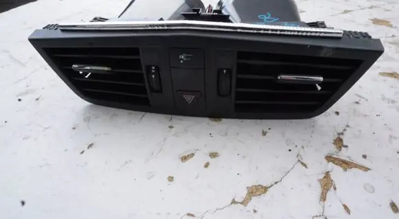 Dash center air vent grill