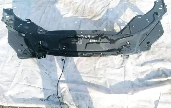 Radiator support slam panel