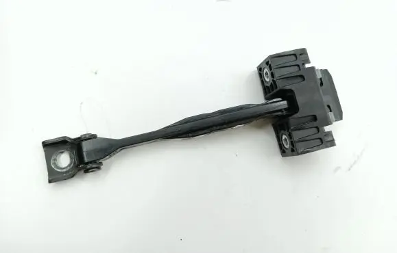 Front door check strap stopper