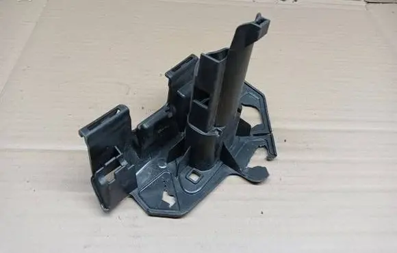 Volkswagen Touran III Headlight washer nozzle holder 5TA807942B DNW17981