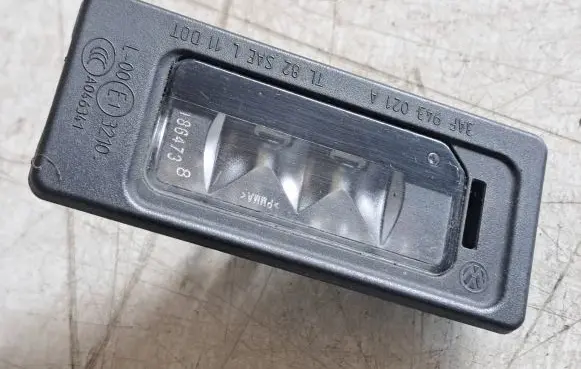 Volkswagen PASSAT B7 Number plate light 3AF943021A