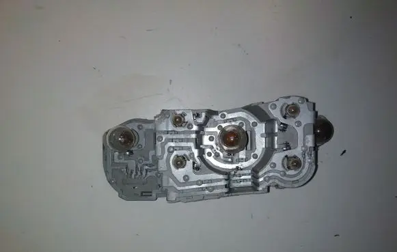 Toyota Corolla Verso E121 Tail light bulb cover holder