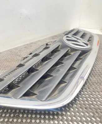 Volkswagen Touran I Front bumper upper radiator grill 1T0853653 1T0853651