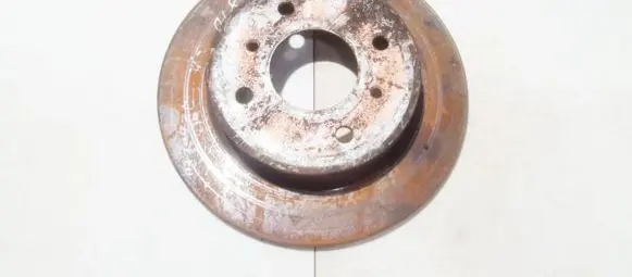 Nissan Almera N16 Rear brake disc neventiliuojamas