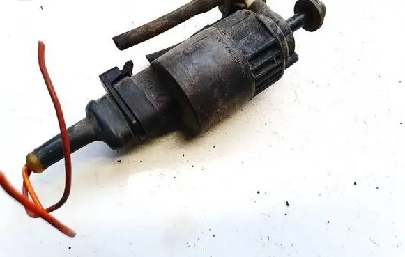 Renault Megane I Windscreen/windshield washer pump 7700821782