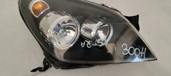 Opel Astra H Headlight/headlamp 1LG270370