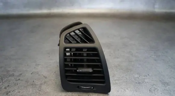 KIA Sorento Dash center air vent grill 97490-2P000