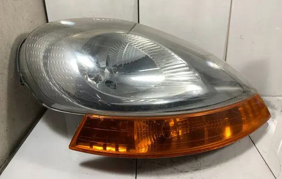 Renault Trafic II (X83) Headlight/headlamp 7700311374
