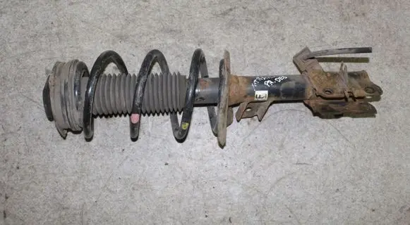 Nissan X-Trail T31 Front shock absorber with coil spring