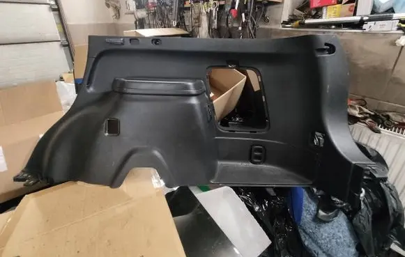 Trunk/boot lower side trim panel