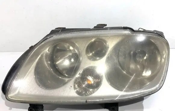 Volkswagen Touran I Headlight/headlamp 1T0941005F