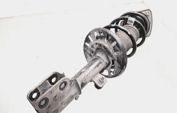 Front shock absorber with coil spring