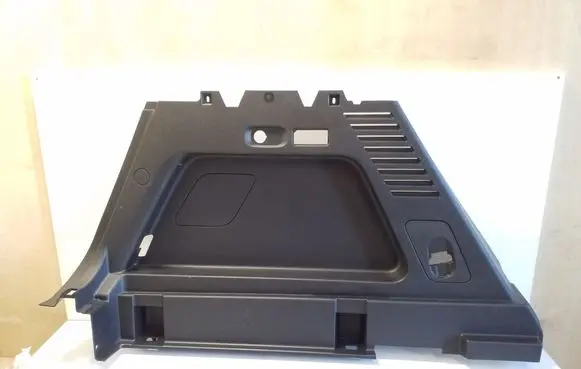 Trunk/boot lower side trim panel