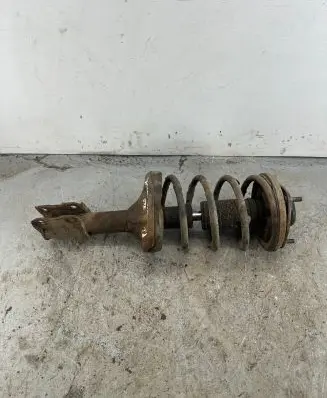 Front shock absorber with coil spring