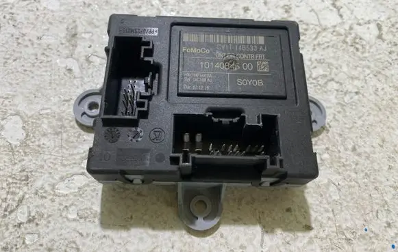 Ford Fiesta Door control unit/module CV1T14B533AJ 14F144AA 1014084500