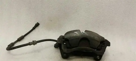Volkswagen Golf VI Front brake caliper