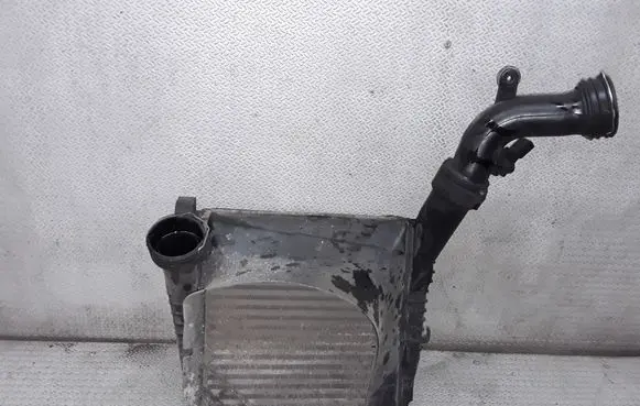 Volkswagen Touareg I Intercooler radiator 7L0145804A