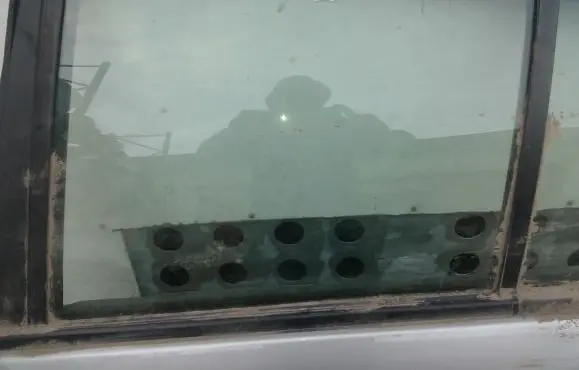 Nissan Almera N16 Rear door window glass