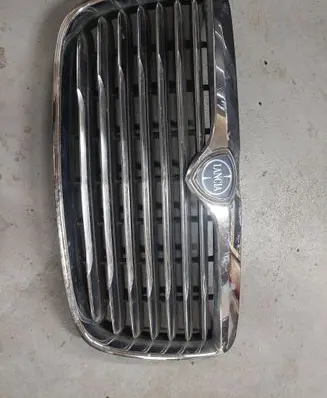 Lancia Thema Front bumper upper radiator grill 9402728 80207 12LX1111AA