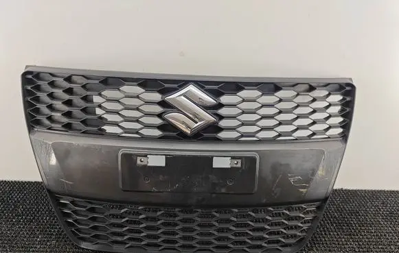 Suzuki Swift II Front bumper upper radiator grill 71174170L0