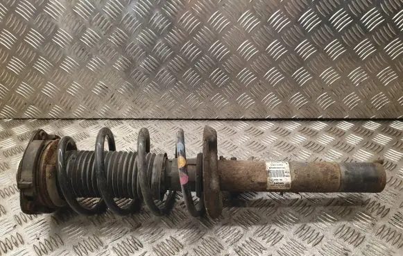 Volkswagen Golf V Front shock absorber with coil spring 1K0413031