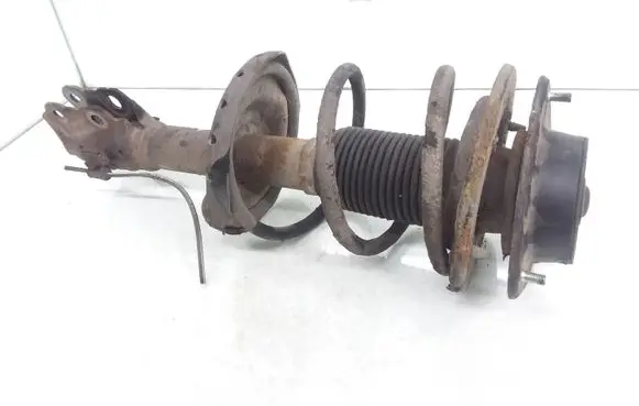 Subaru Impreza III Front shock absorber with coil spring