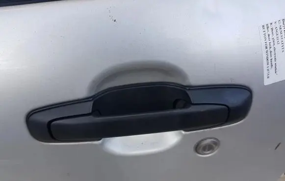 Suzuki Grand Vitara I Front door exterior handle