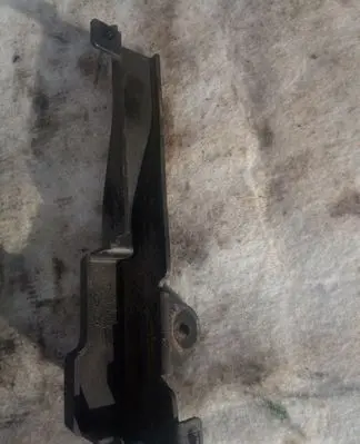 Engine bonnet/hood lock trim molding