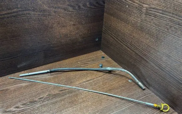 Oil level dip stick