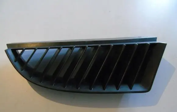 Mitsubishi Colt Front bumper lower grill MN127774