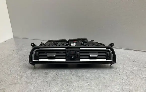 Dash center air vent grill