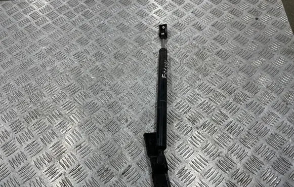 Front door check strap stopper