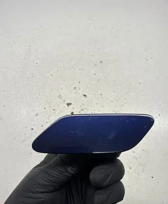 Headlight washer spray nozzle cap/cover